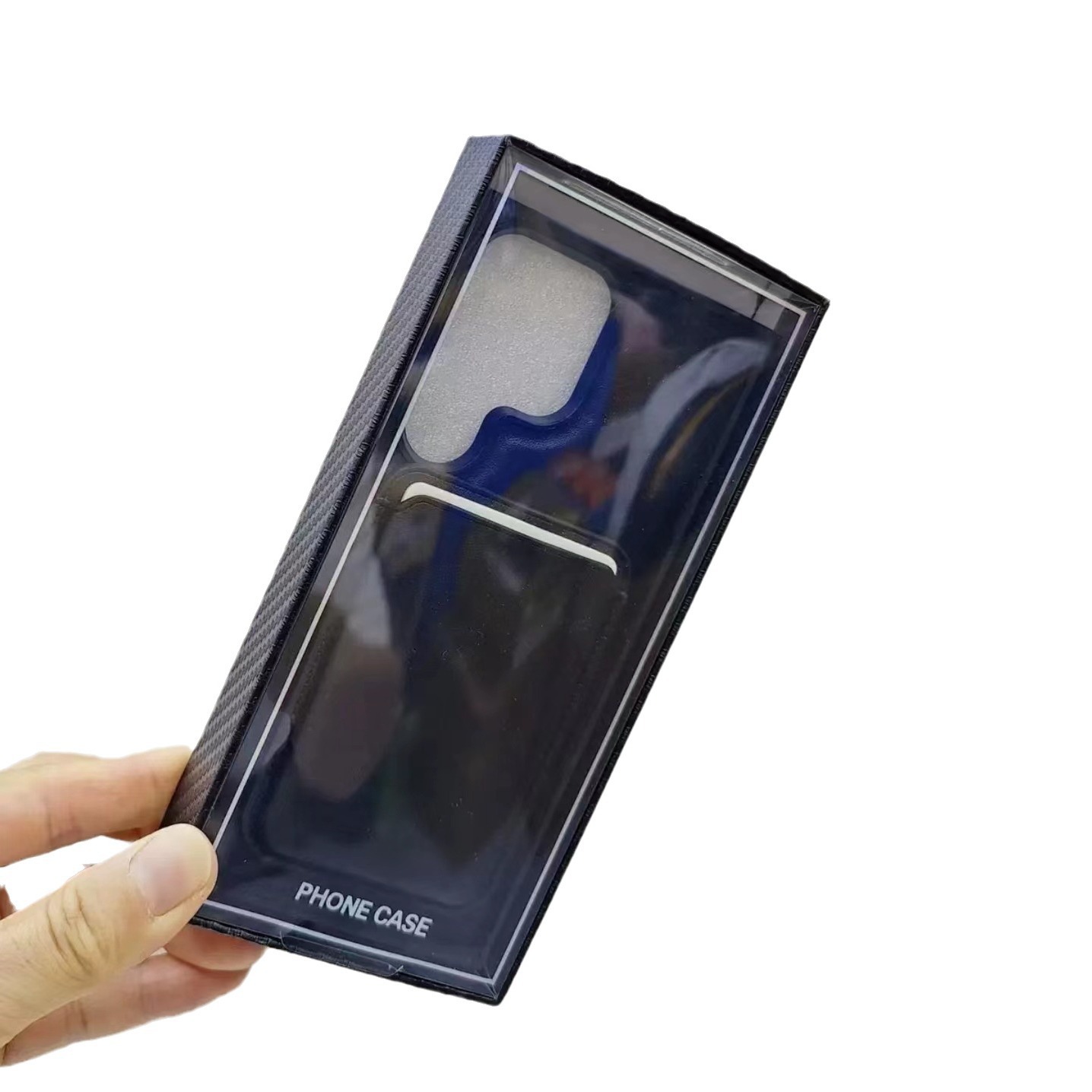 Carbon fiber textured phone case packaging boxes with blister tops are a hot seller on cross-border e-commerce platforms.