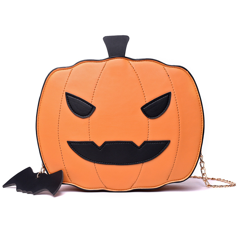 Halloween costume accessories: fun orange Jack-o'-lantern, smiling pumpkin head, bat crossbody bag.