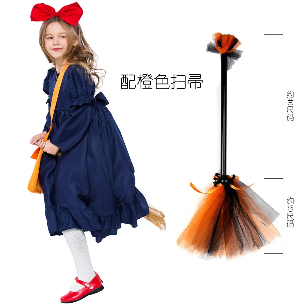 Children's dress + doll + orange broom