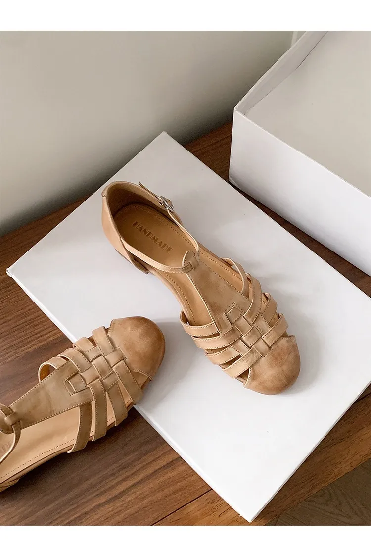Retro woven openwork flat sandals for women, spring and summer, low heel, round toe, versatile, Roman T-strap.