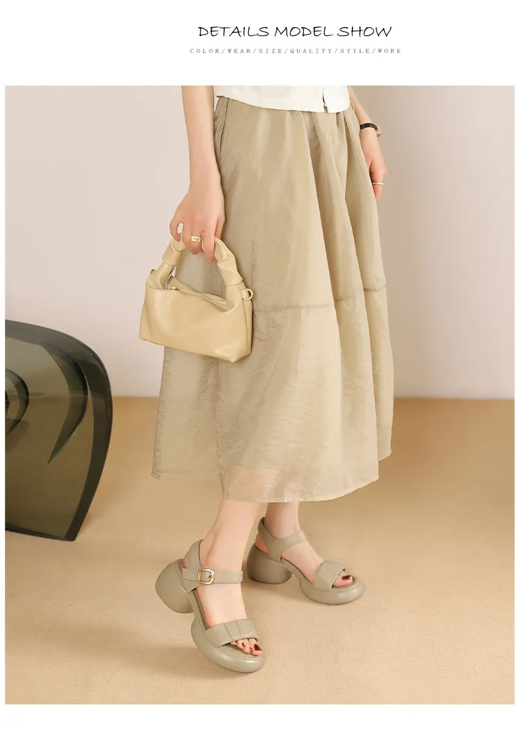 Lightweight, platform, strappy, open-toe, sheepskin casual women's sandals with a comfortable, "walking on clouds" feel.