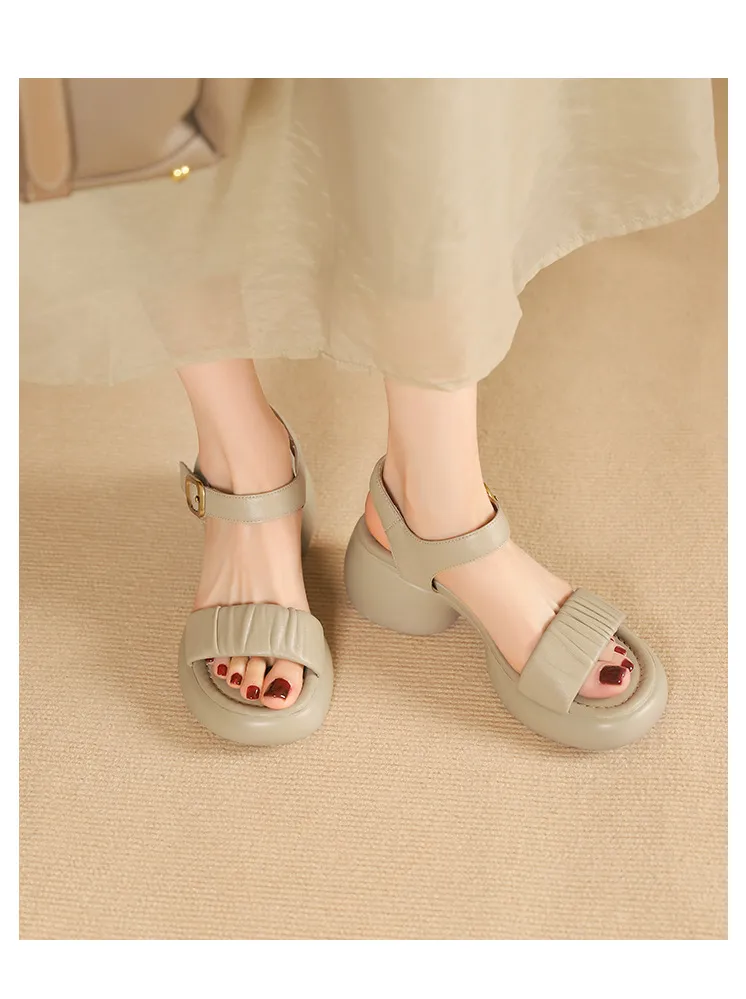 Lightweight, platform, strappy, open-toe, sheepskin casual women's sandals with a comfortable, "walking on clouds" feel.