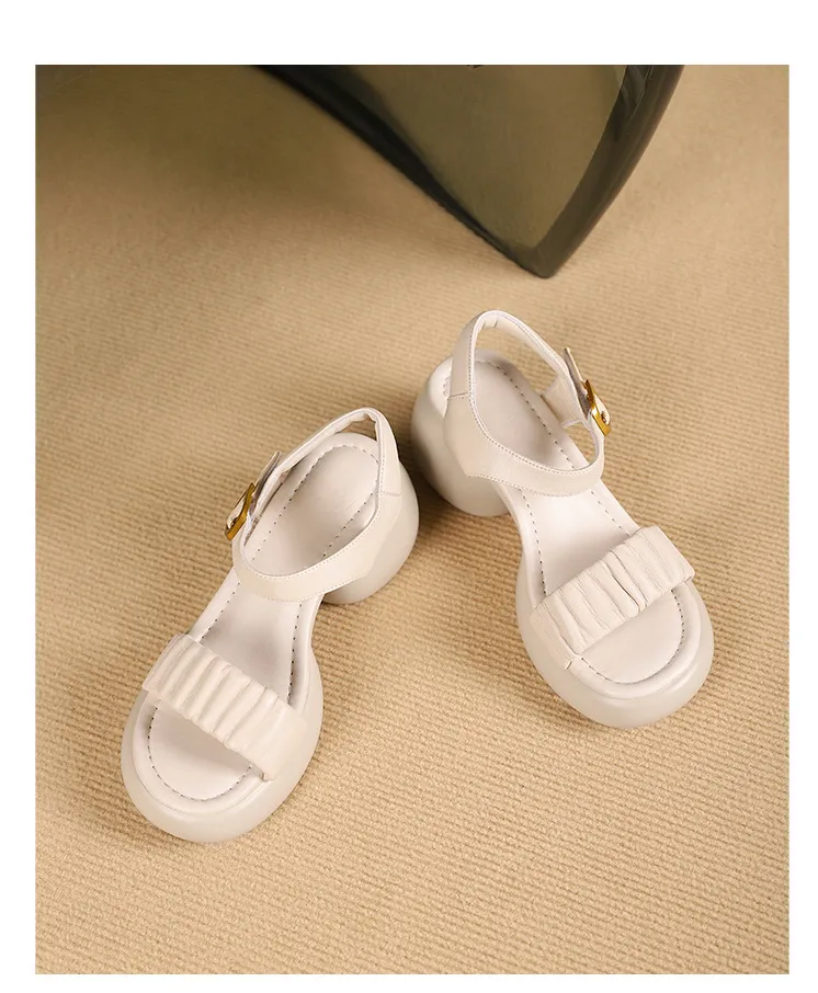 Lightweight, platform, strappy, open-toe, sheepskin casual women's sandals with a comfortable, "walking on clouds" feel.