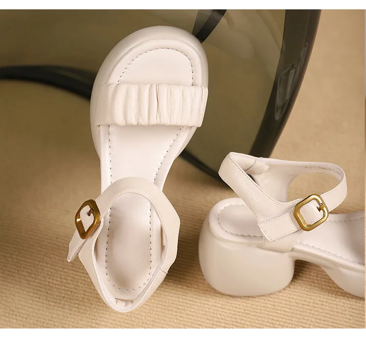 Lightweight, platform, strappy, open-toe, sheepskin casual women's sandals with a comfortable, "walking on clouds" feel.