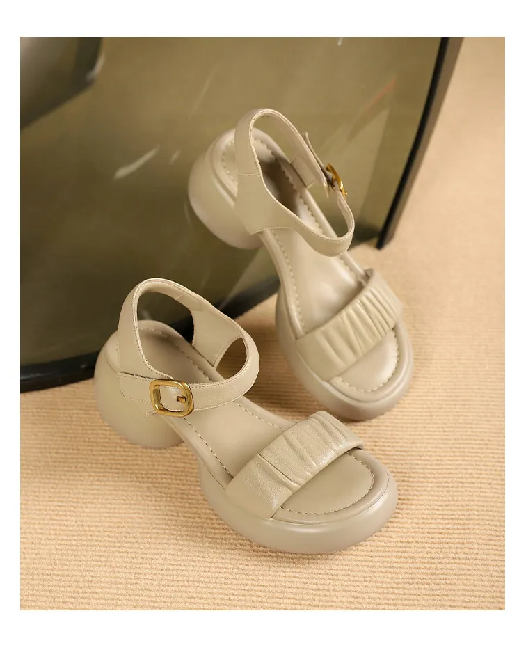 Lightweight, platform, strappy, open-toe, sheepskin casual women's sandals with a comfortable, "walking on clouds" feel.