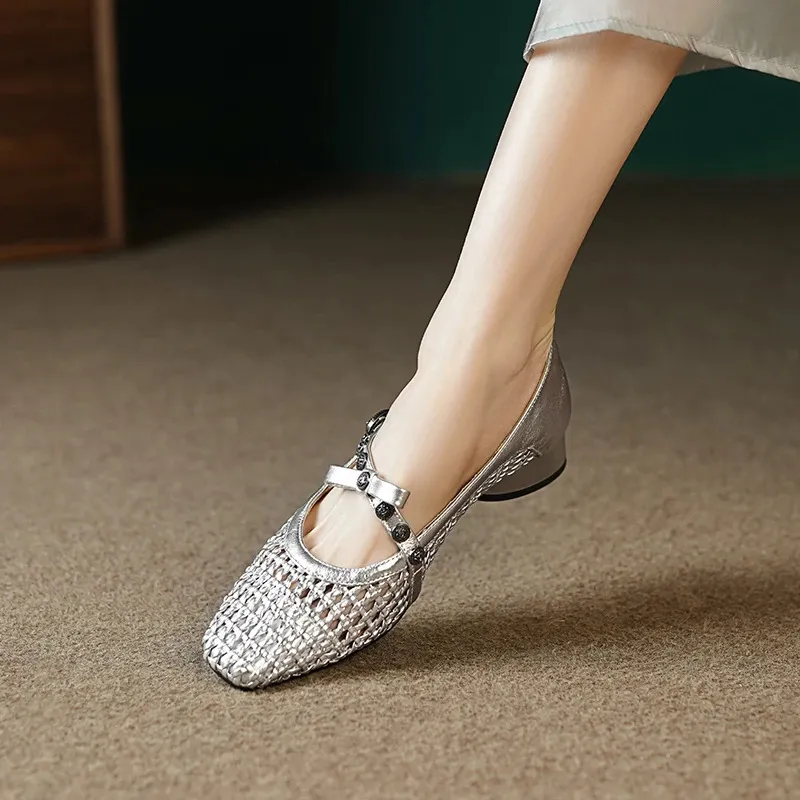 A pair of chunky heel, mid-heel, square-toe, openwork sandals with buckle and color blocking for spring and summer. Comfortable women's shoes.