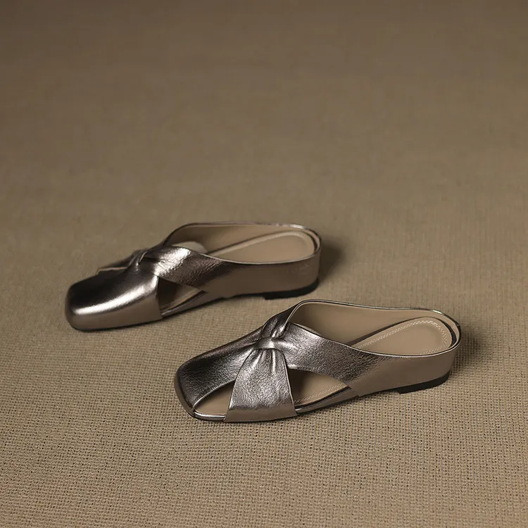 A pair of square-toe slippers, fashionable spring/summer style, made of sheepskin, half-length slippers, comfortable and soft, closed-toe women's shoes.