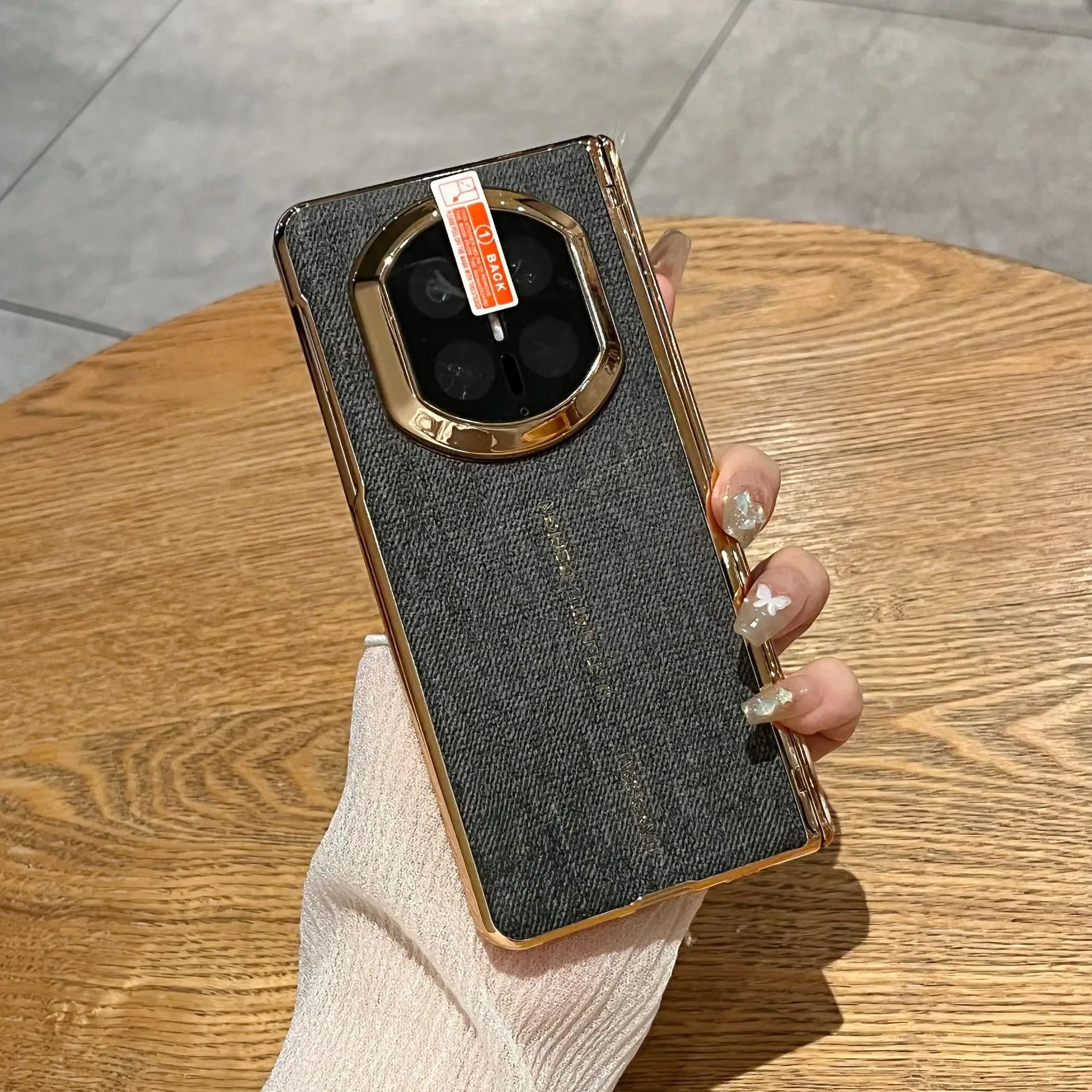 Compatible with Huawei Mate X7 phone case, vegan leather denim textured case, integrated hinge, drop-proof protective case.