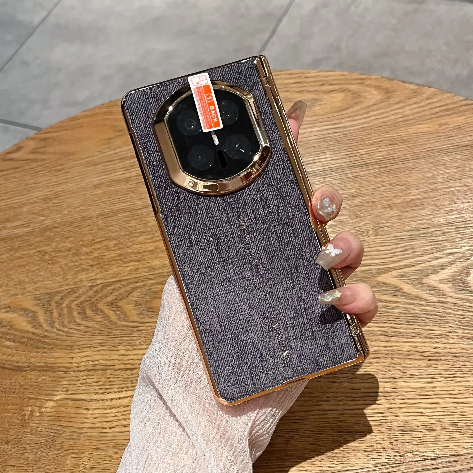 Compatible with Huawei Mate X7 phone case, vegan leather denim textured case, integrated hinge, drop-proof protective case.