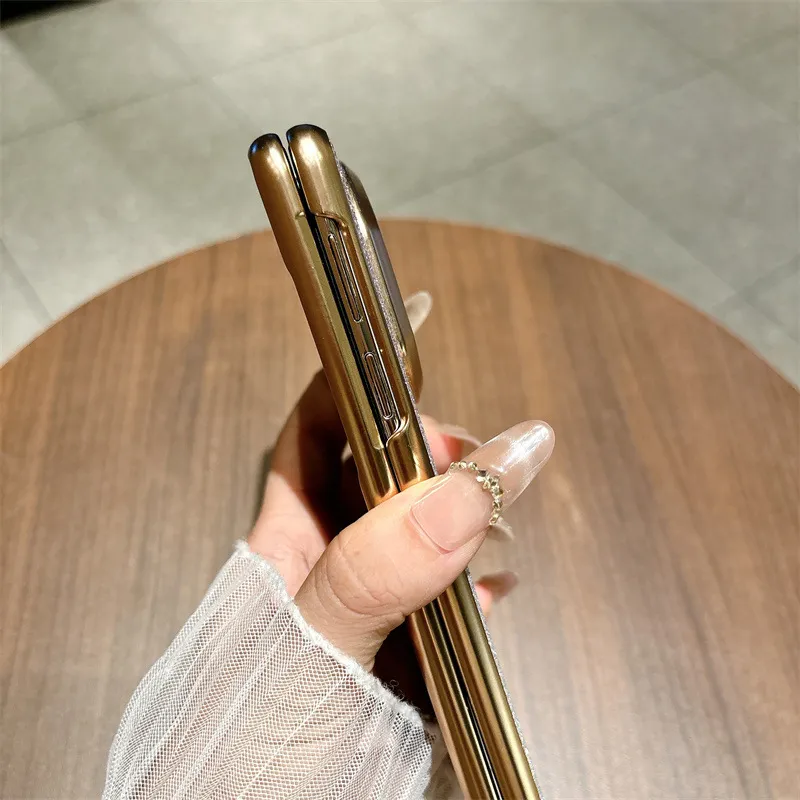 Compatible with Huawei MATE X7 and Mate X6 foldable screen glitter electroplated case with integrated hinge and drop protection.