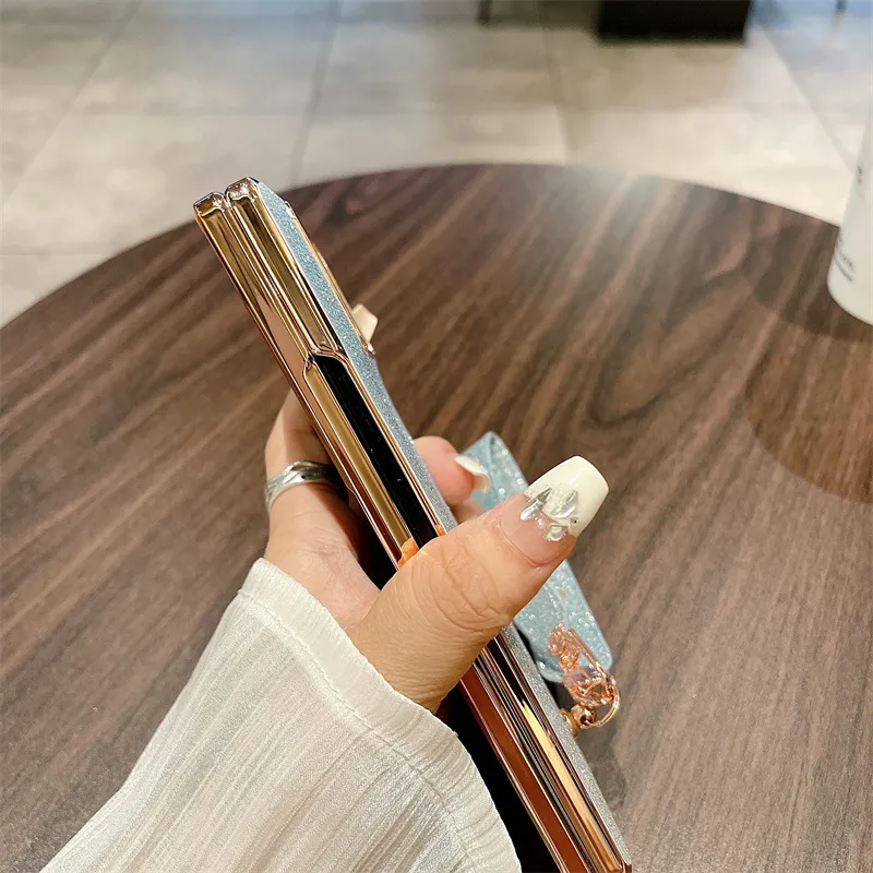 Xiaomi MIX FOLD3 phone case, glittery, wrist strap, drop-proof protective case.