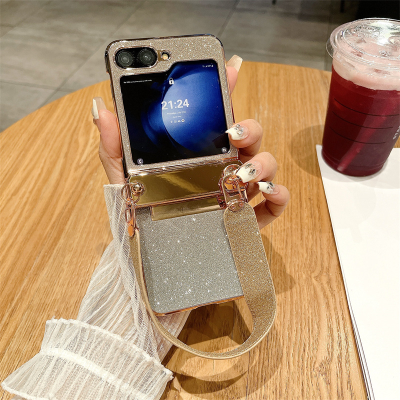 Compatible with Samsung ZFlip 6 phone case, ZFLIP 5 foldable screen glitter wrist strap, full-coverage drop-proof protective leather case - Gold gradient starry wristband zflip6